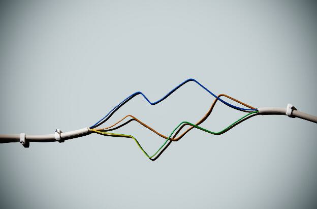 Electric wires of different colors arranged as line graph